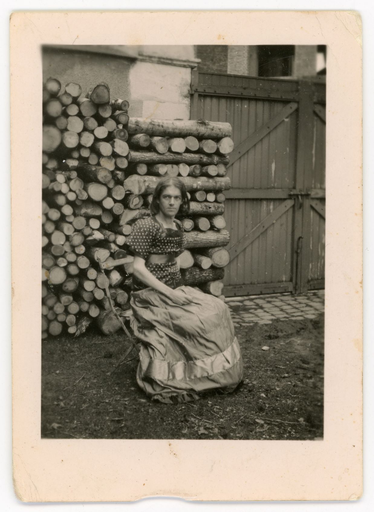 Photo presumed to have been taken in 1944 (in front of the pile of logs)